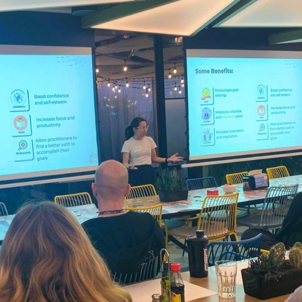 HappyPathLAB facilitator presenting the benefits of a team workshop to studio staff